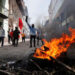 Demonstators set a barricade on fire during a protest against Ecuador's President Lenin Moreno's austerity measures in Quito, Ecuador, October 9, 2019. REUTERS/Henry Romero