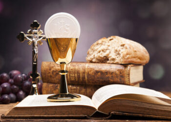 Sacred objects, bible, bread and wine. Studio shots