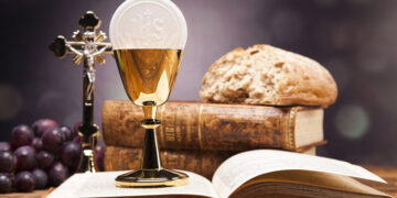 Sacred objects, bible, bread and wine. Studio shots